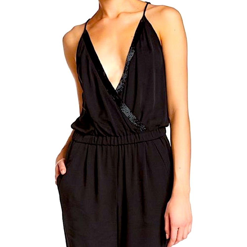 Stunning DVF Silk Romper with beaded bust detail.